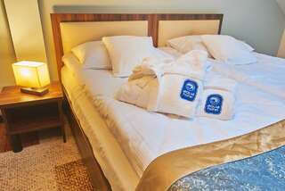 Отель Aquahotel Явожно Двухместный номер с 1 кроватью или 2 отдельными кроватями и дополнительной кроватью-3